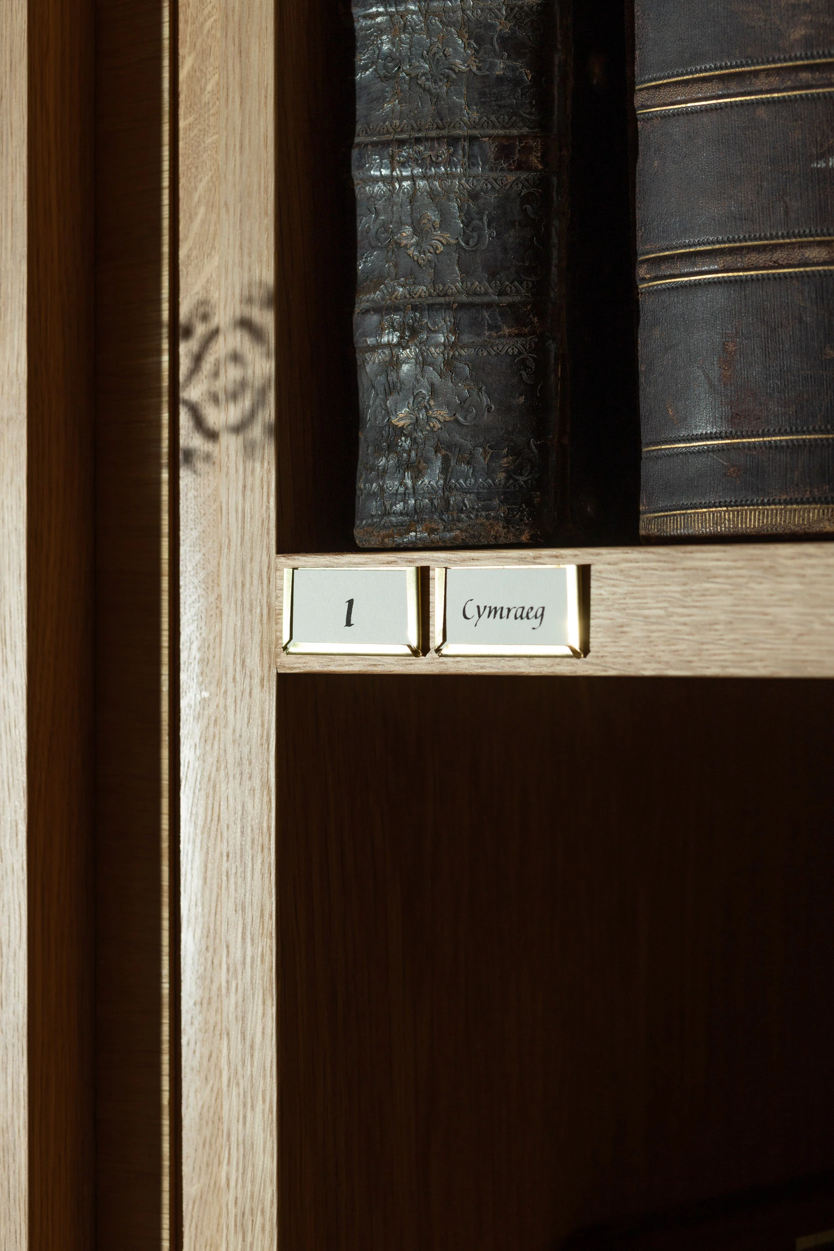 Calligraphy shelfmarks for Ty Mawr Wybrant, National Trust Cymru